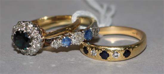 Three assorted 18ct gold, sapphire and diamond dress ring,